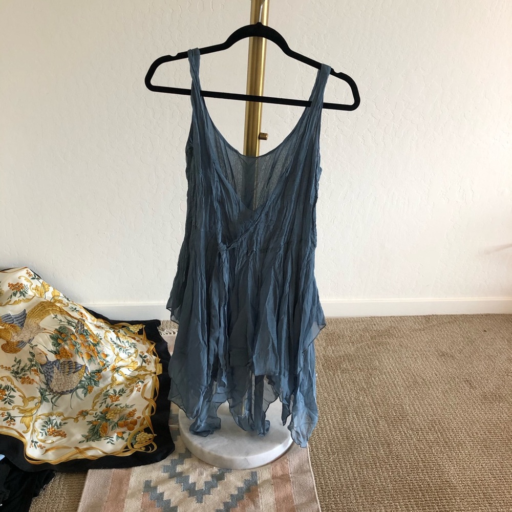 Tethered fairy like dress with tie in back